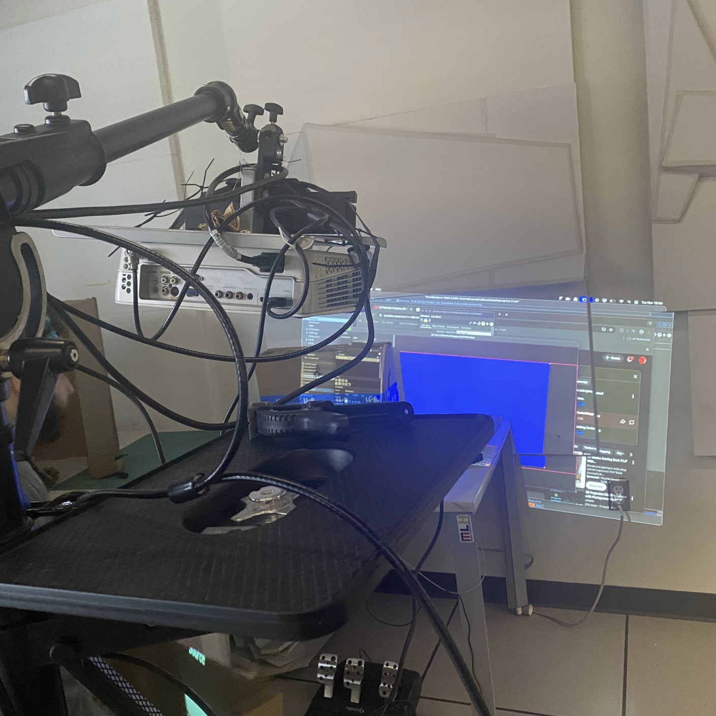 Steve redirected us to another projector in the corner that we could wheel over and was standing upright, so we connected our project to that. 